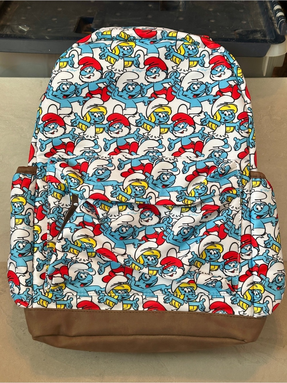The Smurfs Backpack Allover Smurf Collage Design Laptop Pocket Front Pocket